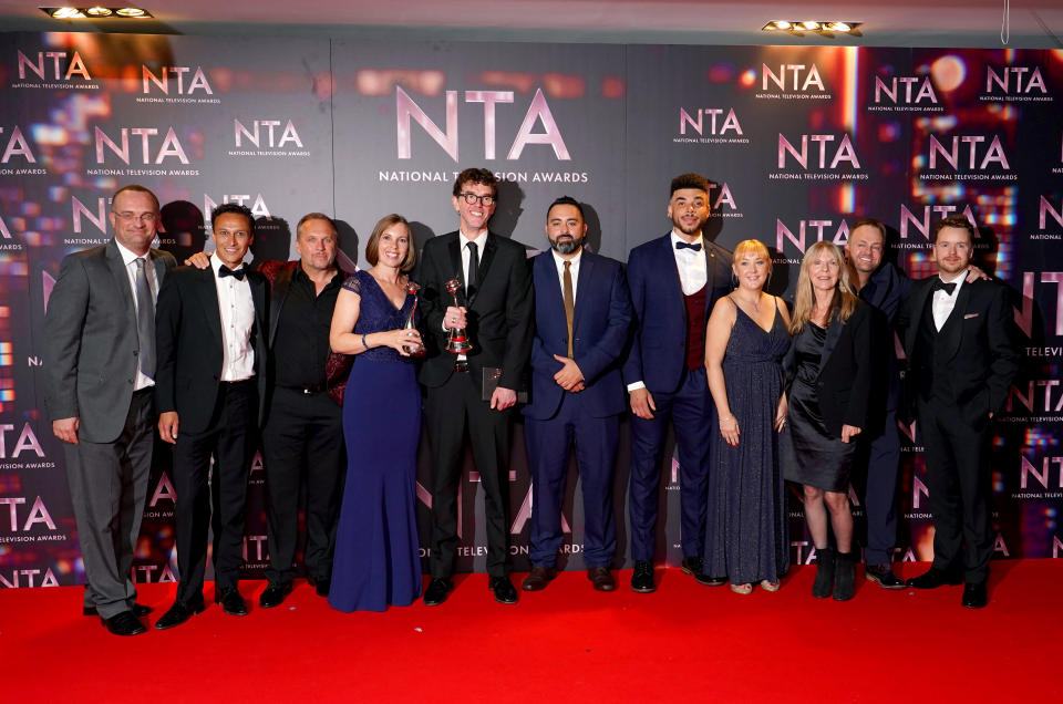 Mark Charnock (centre left) and the cast and crew of Emmerdale in the press room after winning the Serial Drama award at the National Television Awards 2022 held at the OVO Arena Wembley in London. Picture date: Thursday October 13, 2022.