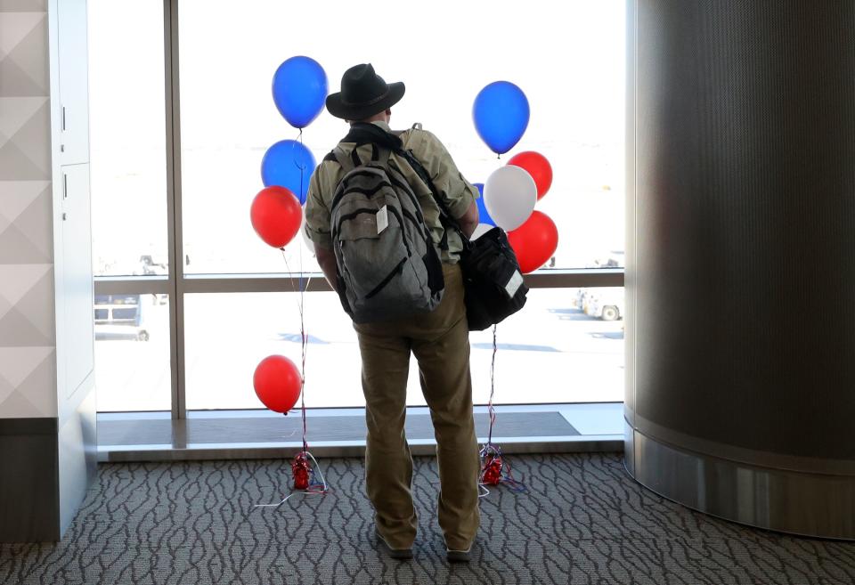 A man checks out the view from a newly opened area of Concourse A at Salt Lake City International Airport in Salt Lake City on Tuesday, Oct. 31, 2023. | Kristin Murphy, Deseret News