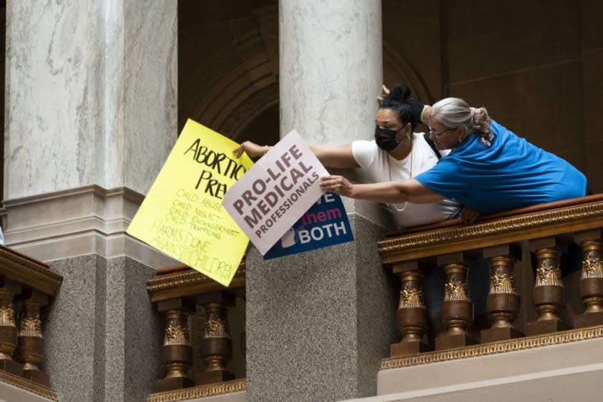 Pro-life and pro-choice demonstrators