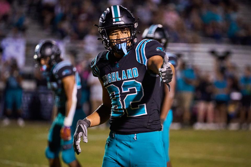 Highland Hawks sophomore tight end Hayden Daugherty (82) looks for the thumbs-up from a referee at Highland High football stadium in Gilbert on Friday, Oct. 21, 2022.