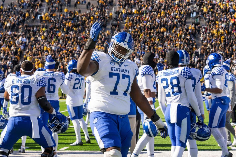 Kentucky offensive lineman Jeremy Flax (77) taunts the crowd in the final minute of the fourth quarter of an NCAA college football game against Missouri, Saturday, Nov. 5, 2022, in Columbia, Mo. Kentucky won 21-17. (AP Photo/L.G. Patterson)