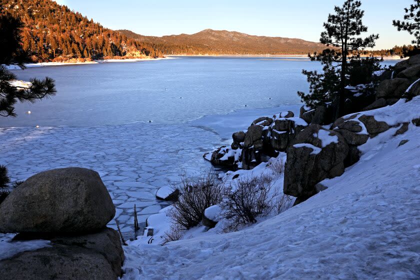 BIG BEAR LAKE, CA - JANUARY 05: Big Bear Lake on Wednesday, Jan. 5, 2022 in Big Bear Lake, CA. Ski and snowboarding season is in full swing in mountain resorts like Big Bear. However, the timing of the storm clashed with an aggressive surge of COVID-19. (Gary Coronado / Los Angeles Times)