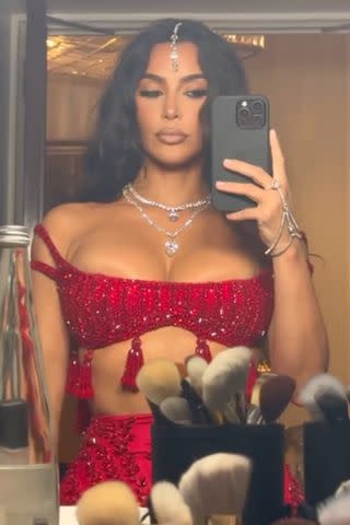 <p>Kim Kardashian/Instagram</p> Kim Kardashian shows off her outfit for the Ambani wedding festivities