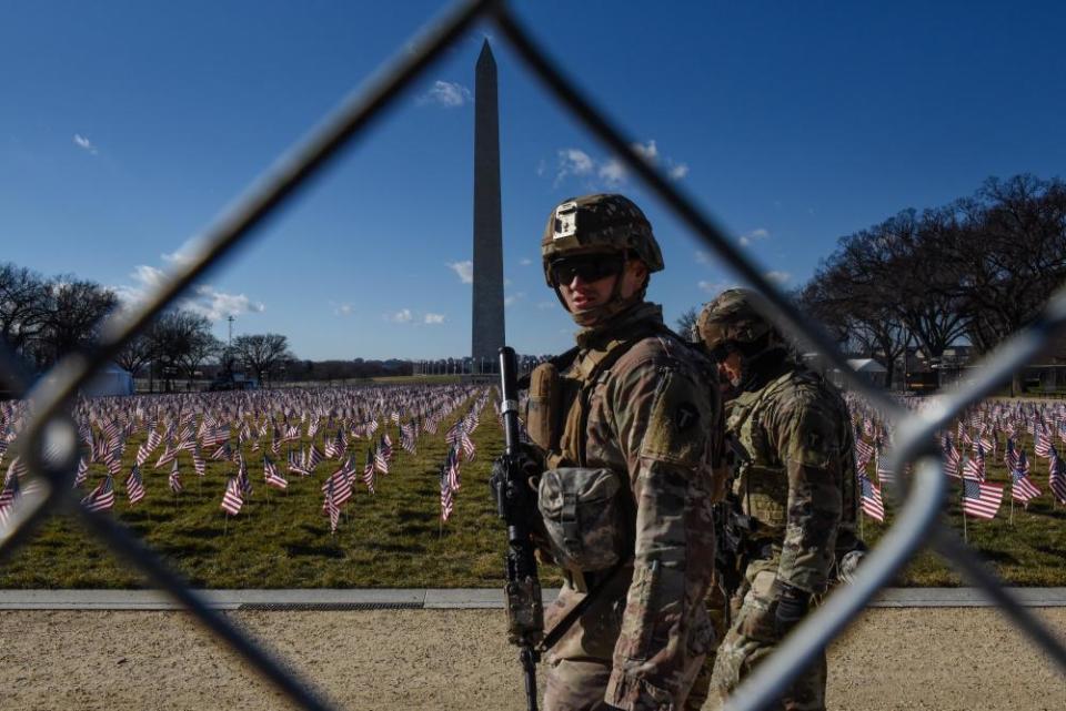 National Guard members patrol the National Mall in Washington DC.