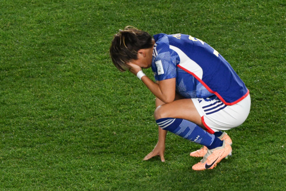 TOPSHOT - A Japanese player reacts after the end of the Australia and New Zealand 2023 Women's World Cup quarter-final football match between Japan and Sweden at Eden Park in Auckland on August 11, 2023. (Photo by Saeed KHAN / AFP) (Photo by SAEED KHAN/AFP via Getty Images)