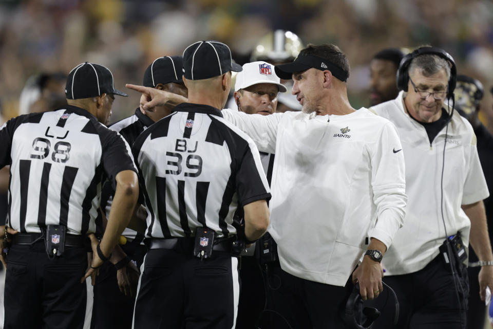 Green Bay Packers head coach Matt LaFleur talks to officials during the second half of a preseason NFL football game against the New Orleans Saints Friday, Aug. 19, 2022, in Green Bay, Wis. (AP Photo/Matt Ludtke)