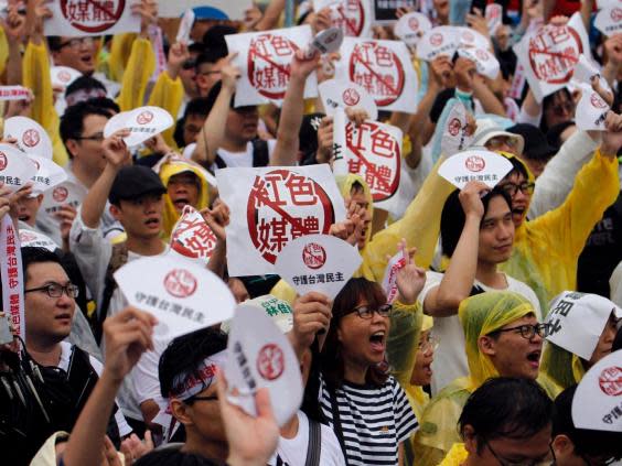 A rally against pro-China media in Taipei in June last year (Getty)