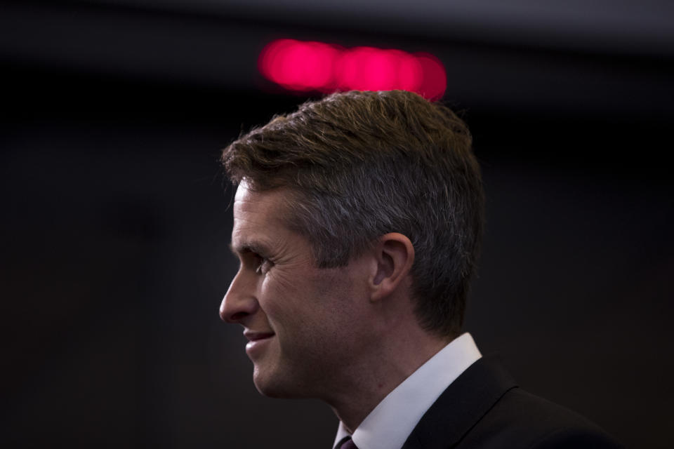 Britain's Defence Minister Gavin Williamson stands in the main chamber during the second day of a meeting of the North Atlantic Council at a gathering of NATO defence ministers at NATO headquarters in Brussels, Thursday, Oct. 4, 2018. British Defence Secretary Gavin Williamson on Thursday branded a series of global cyberattacks blamed on Russia as the reckless actions of a "pariah state" and said that Britain and its NATO allies would expose such actions in the future. (AP Photo/Francisco Seco)