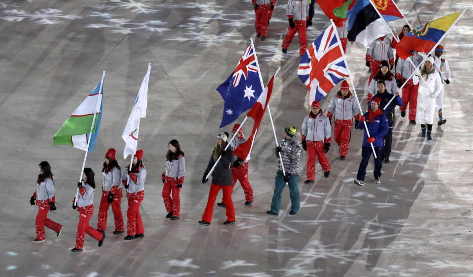 <p>Athletes walk into the stadium during the closing ceremony of the 2018 Winter Olympics in Pyeongchang, South Korea, Sunday, Feb. 25, 2018. (AP Photo/Aaron Favila) </p>