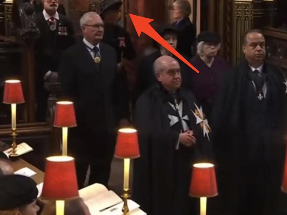 arrow pointing to Sandra oh in the queen's funeral procession
