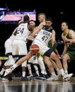 United States' Joe Harris, center, controls the ball during their exhibition basketball game against Australia in Melbourne, Thursday, Aug. 22, 2019. (AP Photo/Andy Brownbill)