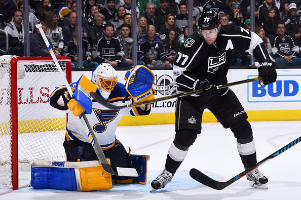 LOS ANGELES, CA - MARCH 13: Jake Allen #34 of the St. Louis Blues makes a save with pressure from Jeff Carter #77 of the Los Angeles Kings during the game on March 13, 2017 at Staples Center in Los Angeles, California. (Photo by Juan Ocampo/NHLI via Getty Images)