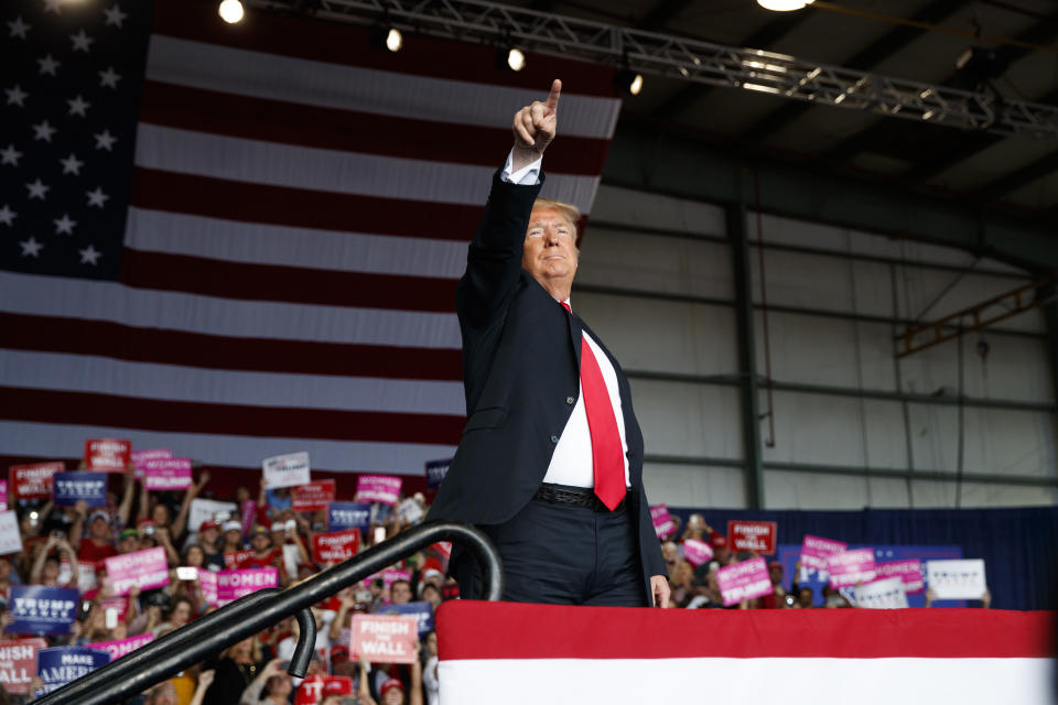 President Donald Trump arrives to speak at a campaign rally, Sunday, Nov. 4, 2018, in Macon, Ga. (AP Photo/Evan Vucci)