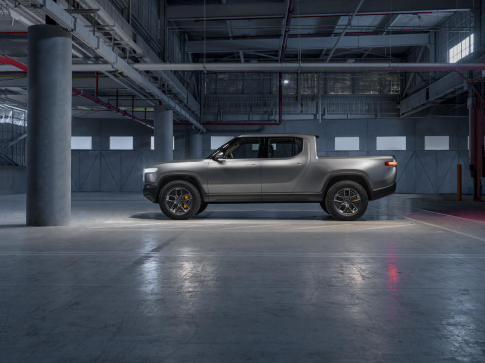 Amazon is staking a claim in the EV market after it led a $700 millioninvestment round in electric pickup truck and SUV maker Rivian