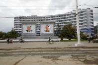 Portraits of former leaders Kim Il Sung and Kim Jong Il are seen in central Wonsan, North Korea October 2016. Christian Peterson-Clausen/Handout via REUTERS