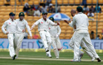 Australia's players celebrate the wicket of India's captain Virat Kohli. REUTERS/Danish Siddiqui