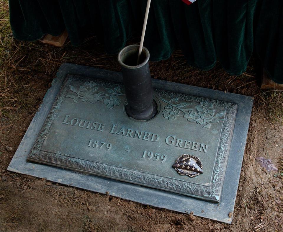 Louise L. Green's veterans medallion is placed on her grave marker on Veterans Day in Hendersonville.