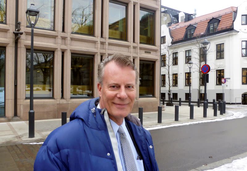 FILE PHOTO: Johan H. Andresen, a Norwegian investor and the chair of the ethics watchdog for NorwayÕs sovereign wealth fund, poses for a picture in front of the Norwegian central bank in Oslo