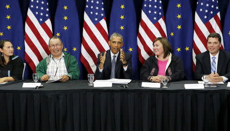 U.S. President Barack Obama (C) participates in a roundtable with Alaska natives before delivering remarks to the GLACIER Conference at the Dena'ina Civic and Convention Center in Anchorage, Alaska August 31, 2015. REUTERS/Jonathan Ernst