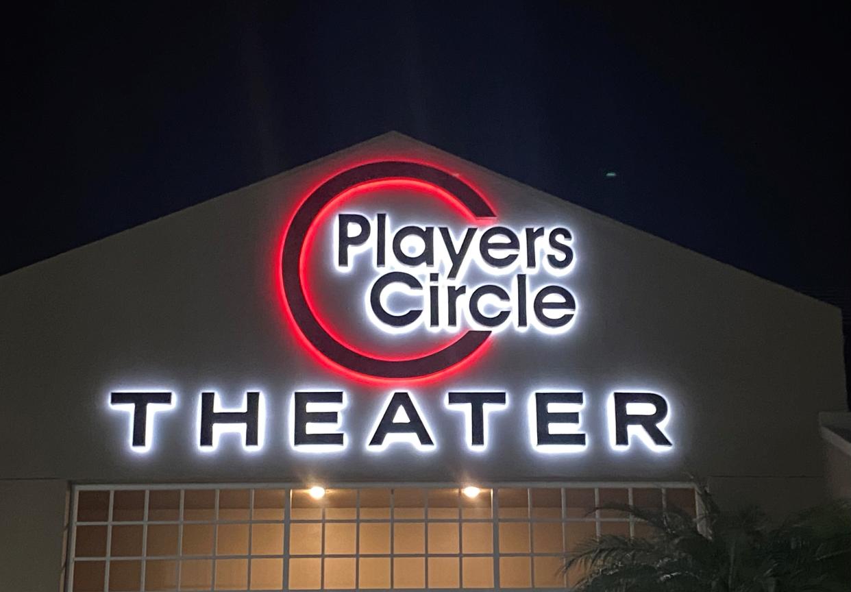 Players Circle Theater's $20,000 neon sign lights the way to its new McGregor Boulevard location.