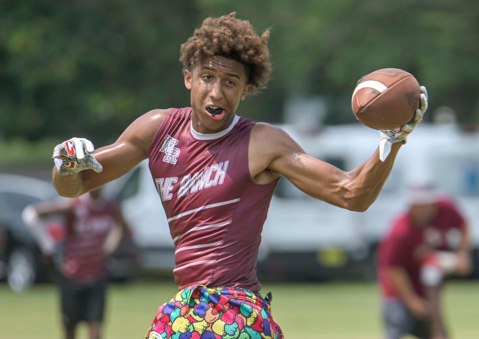 Wiregrass Ranch High School Bulls’ Bryson Rodgers catches a pass at the Florida High School 7v7 Association state championship in The Villages on Friday, June 24, 2022. [PAUL RYAN / CORRESPONDENT]