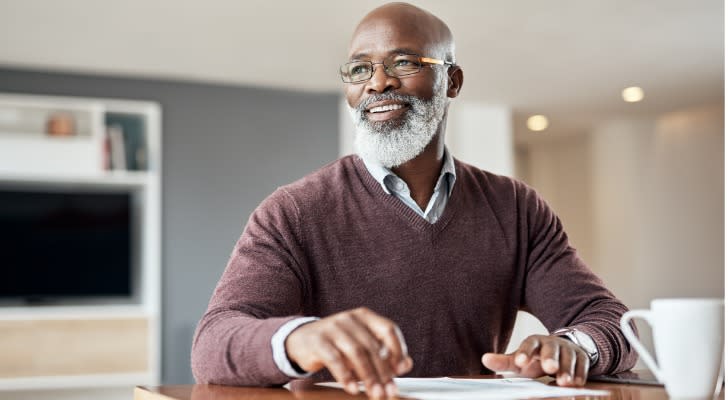 A man contemplates his financial plan for retirement.