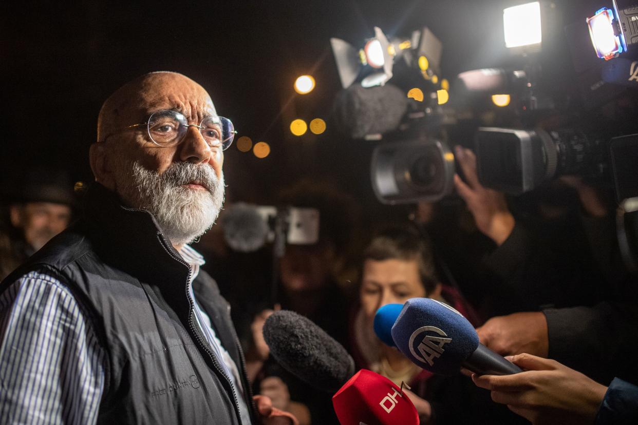 Turkish journalist and writer Ahmet Altan speaks to journalists