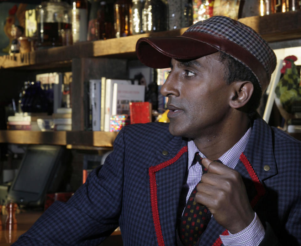 Chef Marcus Samuelsson, owner of the Red Rooster, is interviewed at the restaurant, in New York, Tuesday, Feb. 7, 2012. (AP Photo/Richard Drew)