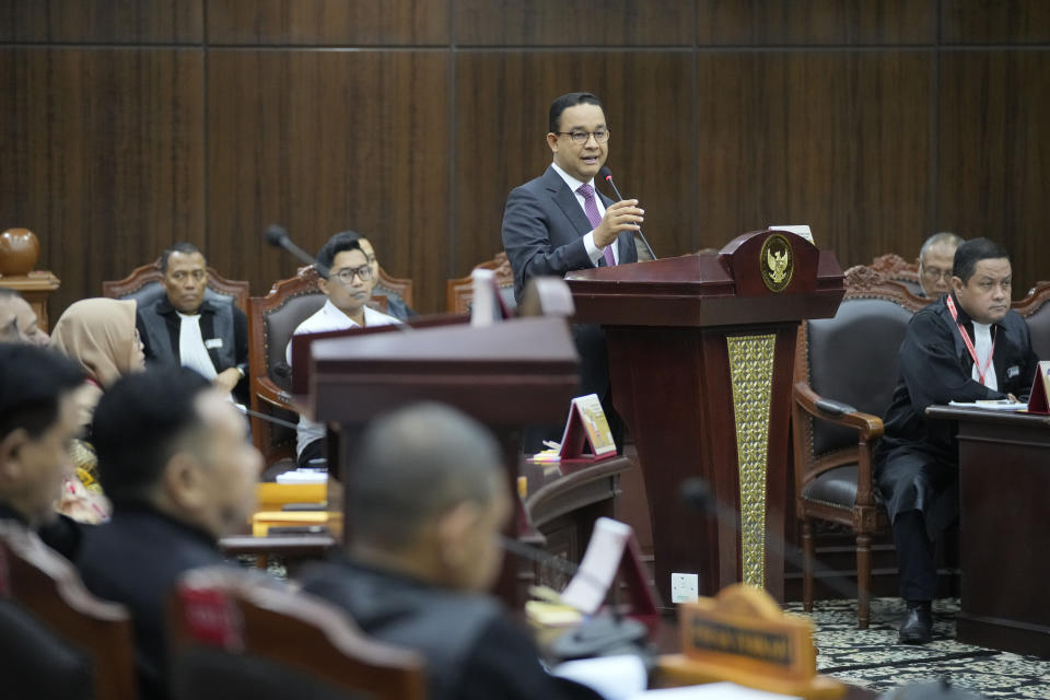 Losing presidential candidate Anies Baswedan speaks at the start of the first hearing of his legal challenge to the Feb. 14 presidential election alleging widespread fraud, at the Constitutional Court in Jakarta, Indonesia, Wednesday, March 27, 2024. Defense Minister Prabowo Subianto, who chose the son of the popular outgoing President Joko Widodo as his running mate, won the election by 58.6% of the votes, according to final results released by the Election Commission. (AP Photo/Dita Alangkara)