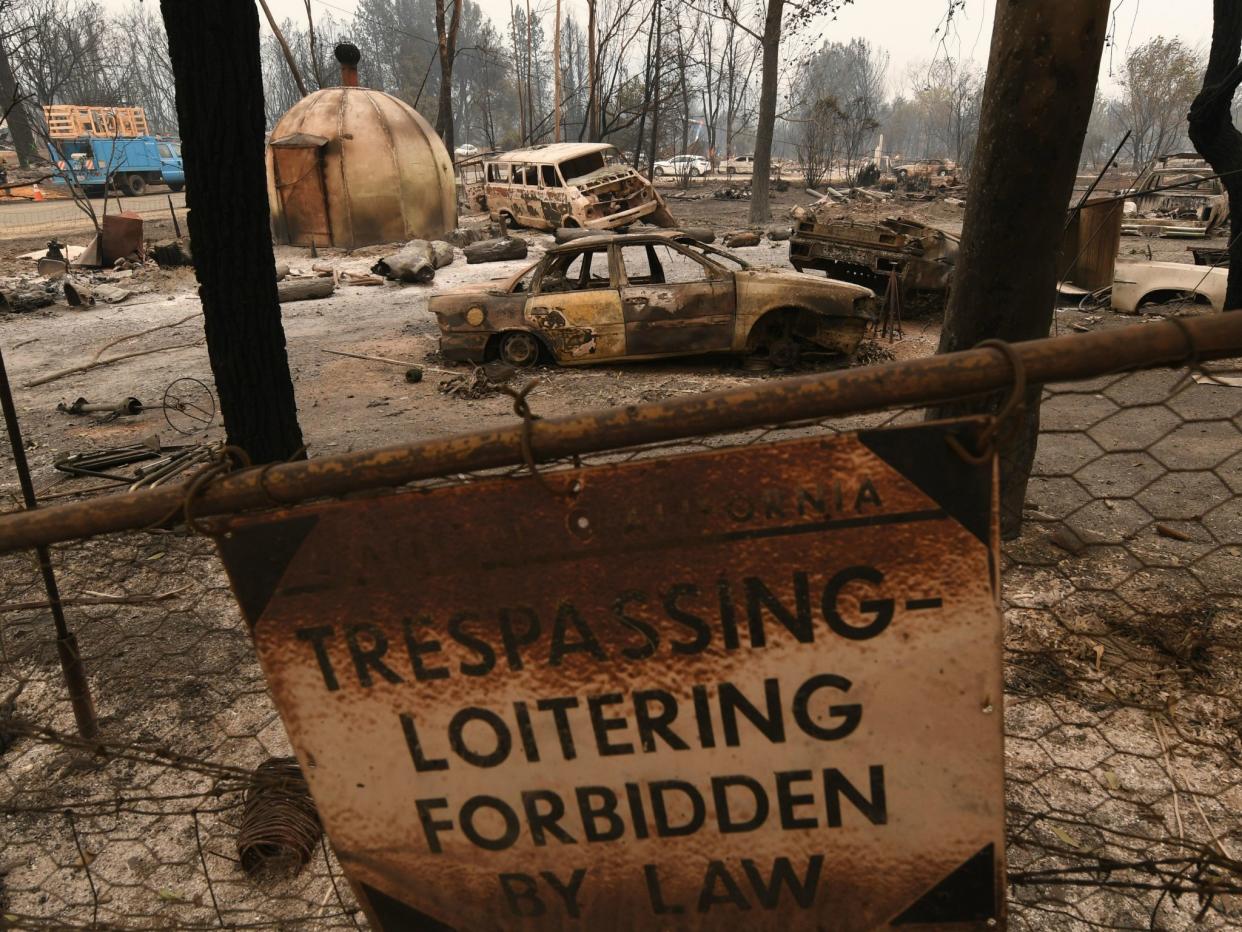 Burned house and cars in the Keswick neighbourhood of Redding, California as a result of the Carr wildfire: MARK RALSTON/AFP/Getty Images