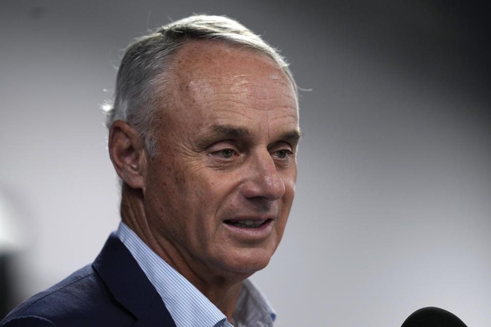 Major League Baseball commissioner Rob Manfred speaks during a baseball spring training media day Thursday, Feb. 15, 2024, in Tampa, Fla. (AP Photo/Charlie Neibergall)