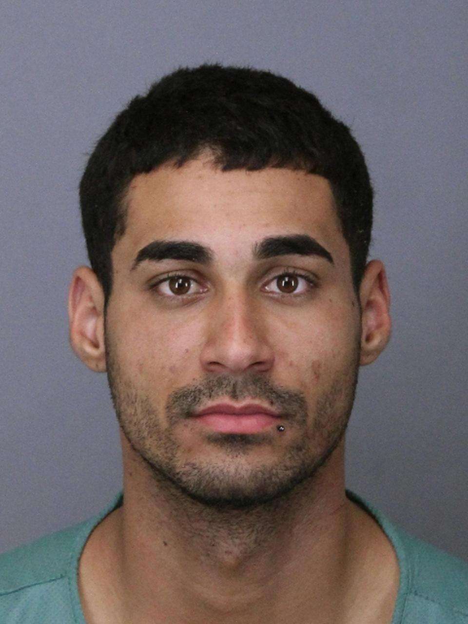 FILE - This file photo provided by the Lakewood Police Department on Friday, April 26, 2019, shows Rogel Lazaro Aguilera-Mederos. Prosecutors, on Monday, May 20, 2019, want a judge to require a GPS monitor for Aguilera-Mederos, now that he has posted bail. Aguilera-Mederos, a truck driver, is accused of causing a fiery pileup on April 25, that killed four people on a Colorado highway. (Lakewood Police Department via AP, File)