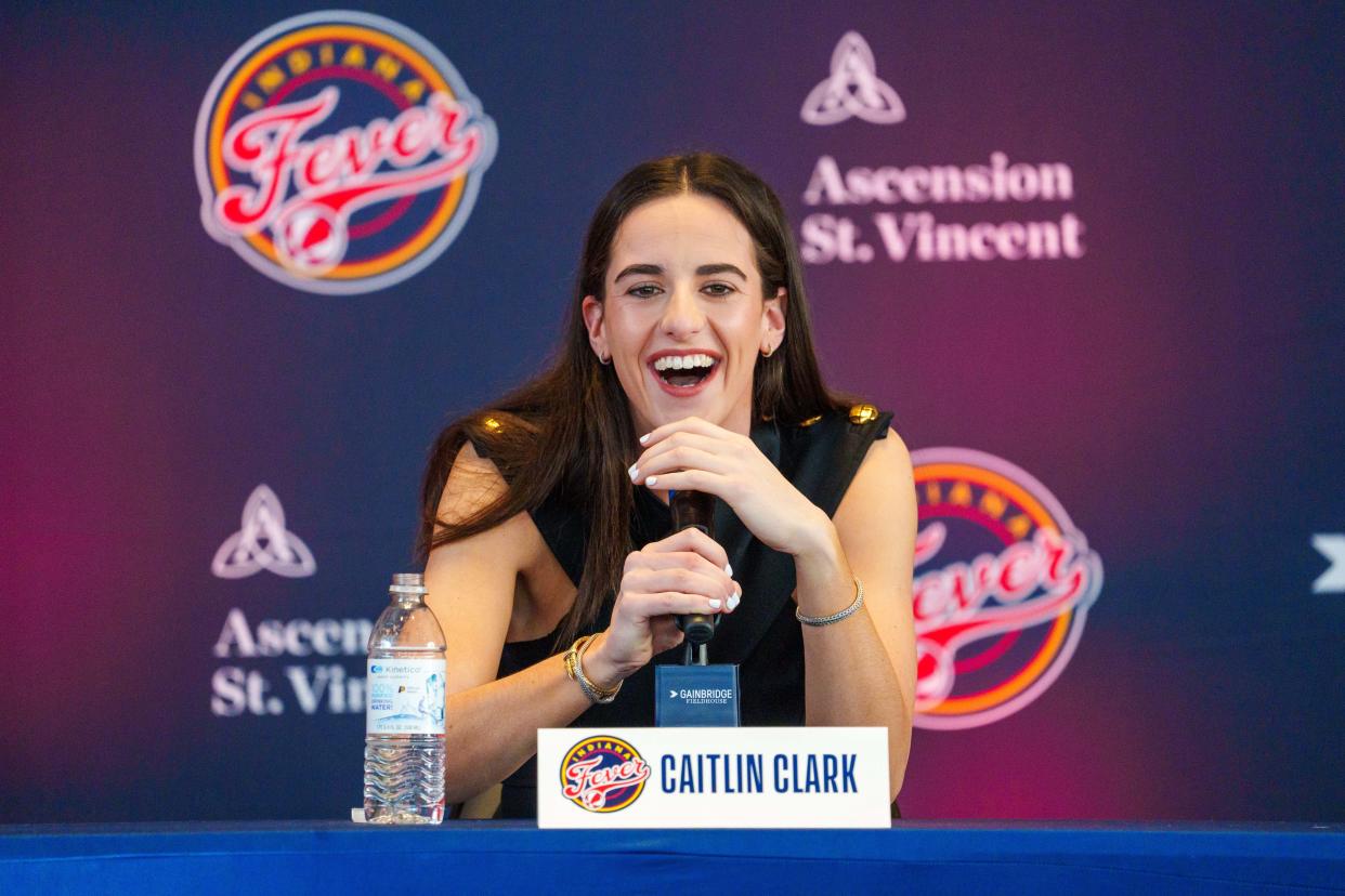Indiana Fever player Caitlin Clark, former Iowa Hawkeye standout and the No. 1 pick in the 2024 WNBA draft, speaks during an introductory press conference.