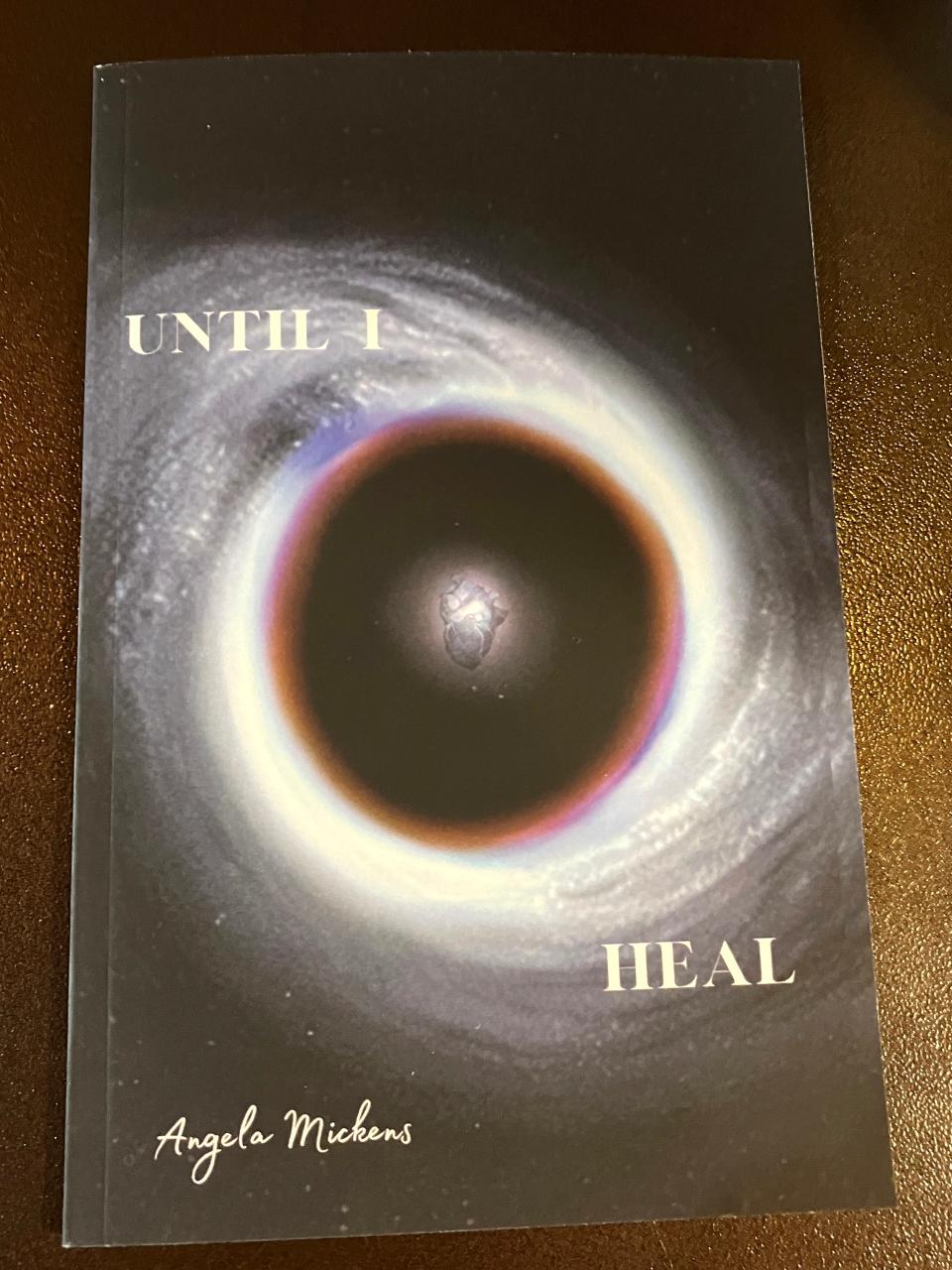 Angela Mickens' first book of poetry, "Until I Heal."