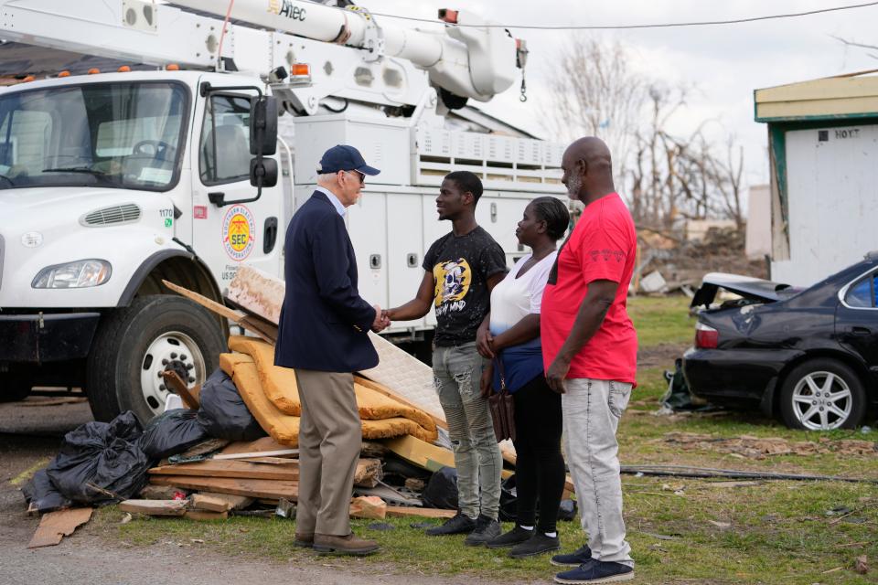 President Joe Biden speaks with those impacted by last week's deadly tornado and severe storm in Rolling Fork on Friday.