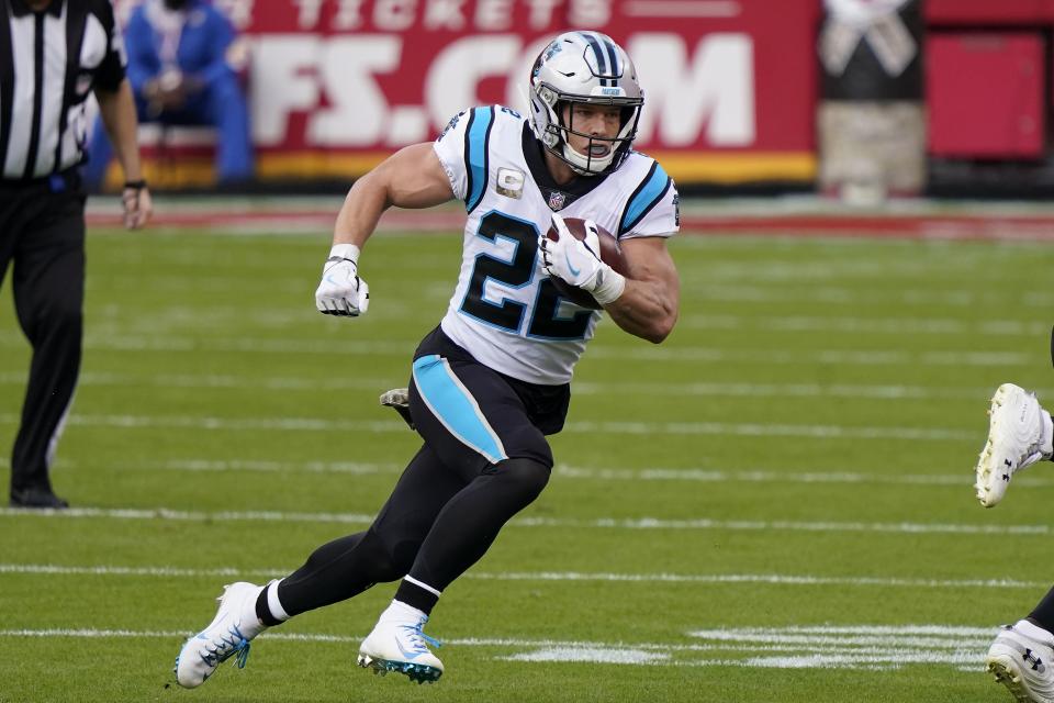 Carolina Panthers running back Christian McCaffrey (22) runs against the Kansas City Chiefs during the first half of an NFL football game in Kansas City, Mo., Sunday, Nov. 8, 2020. (AP Photo/Jeff Roberson)