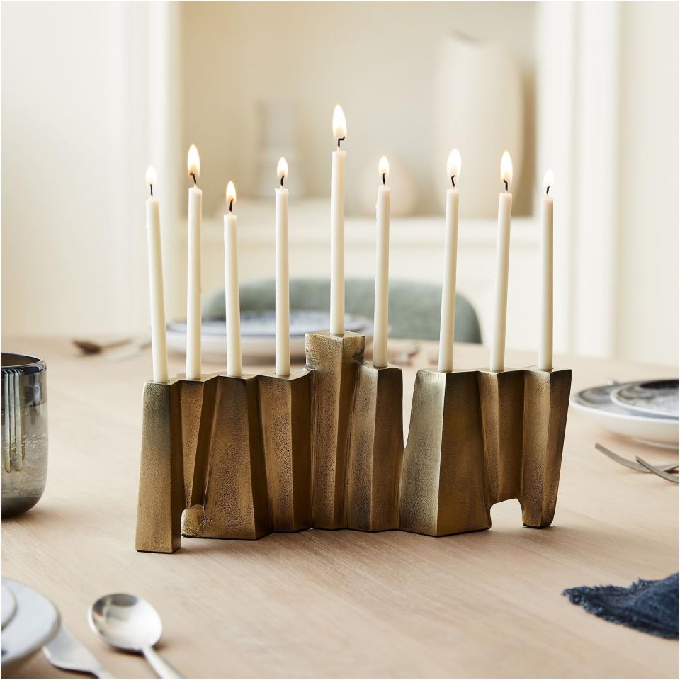 <p><a href="https://go.redirectingat.com?id=74968X1596630&url=https%3A%2F%2Fwww.westelm.com%2Fproducts%2Fgeometric-metal-menorah-d16814&sref=https%3A%2F%2Fwww.thepioneerwoman.com%2Fholidays-celebrations%2Fgifts%2Fg45825939%2Fhanukkah-gifts%2F" rel="nofollow noopener" target="_blank" data-ylk="slk:Shop Now;elm:context_link;itc:0;sec:content-canvas" class="link ">Shop Now</a></p><p>Geometric Metal Menorah</p><p>westelm.com</p><p>$55.20</p>