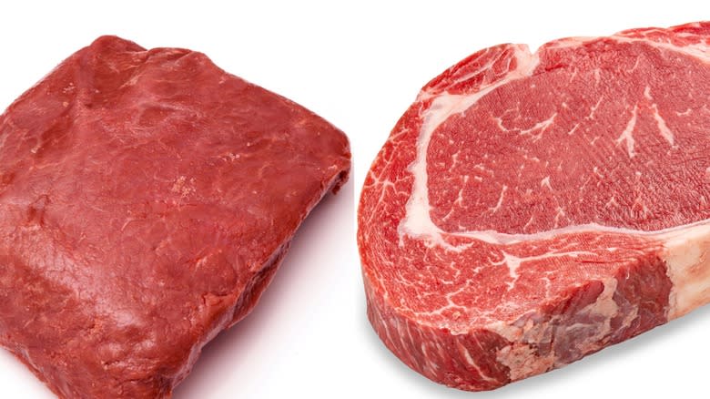 Uncooked ostrich meat and beef side by side on white background