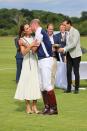 <p>Will and Kate engaged in a rare moment of PDA at William's charity polo match.</p>