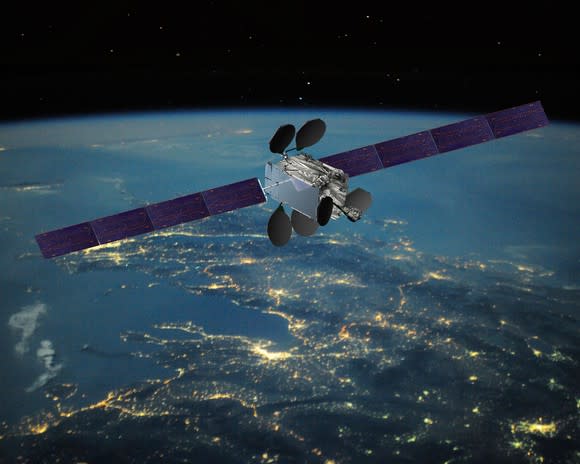 An Intelsat EpicNG satellite above Earth.