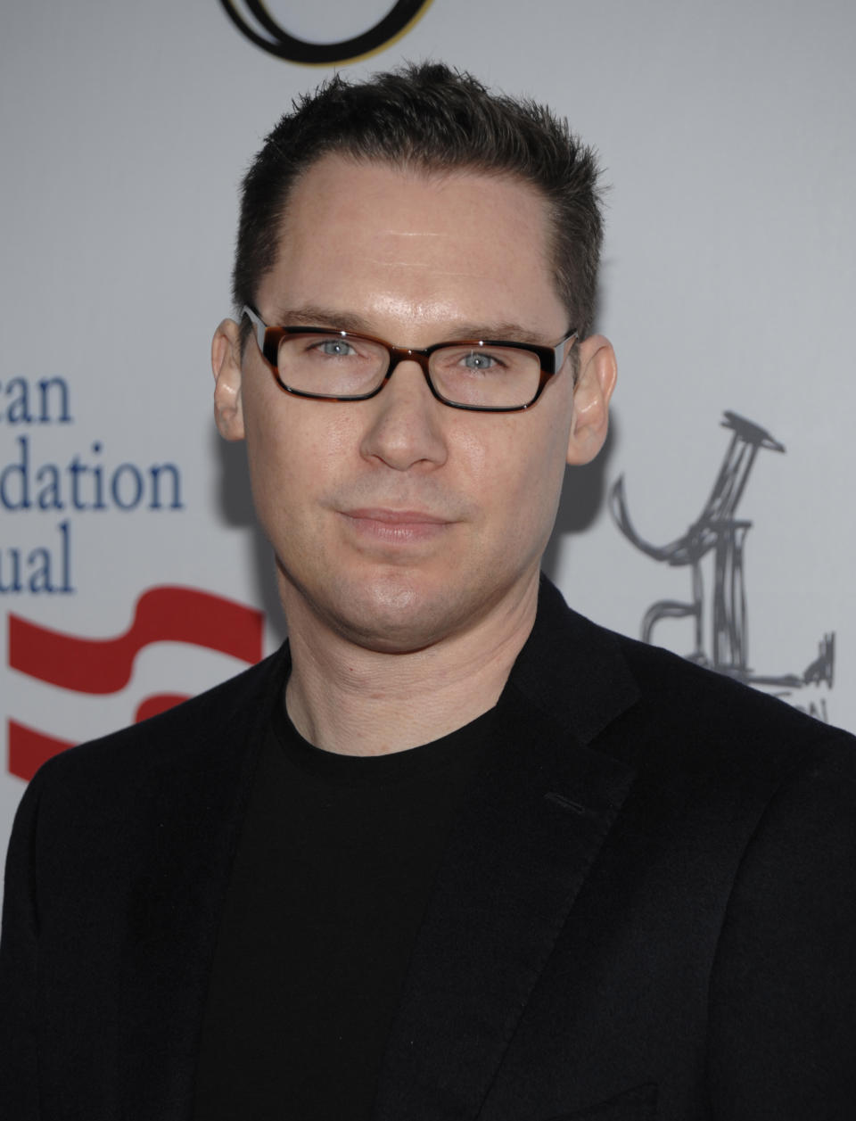 FILE - In this March 3, 2012 file photo, director Bryan Singer arrives at the Los Angeles premiere of the play "8" in Los Angeles. Singer released a statement on Thursday, April 24, 2014, denying allegations by Michael Egan III that the director sexually assaulted him when he was underage in 1999 and called them "outrageous, vicious and completely false." The director of the upcoming film "X-Men: Days of Future Past" also said he is avoiding media promotions of the film to avoid creating a distraction. (AP Photo/Dan Steinberg, file)