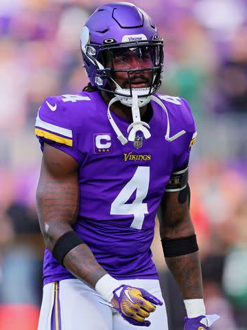 <p>Adam Bettcher/Getty</p> Dalvin Cook during pregame against the New York Jets at U.S. Bank Stadium on December 04, 2022 in Minneapolis, Minnesota.