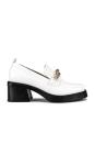 <p><strong>Chelsea Paris</strong></p><p>revolve.com</p><p><strong>$248.00</strong></p><p>For a bright white heeled loafer, this Chelsea Paris design will be up your alley. There's a small pull tab on the heel so it's easy to take on and off and, of course, the gold chain detail on the vamp adds some flare. </p>