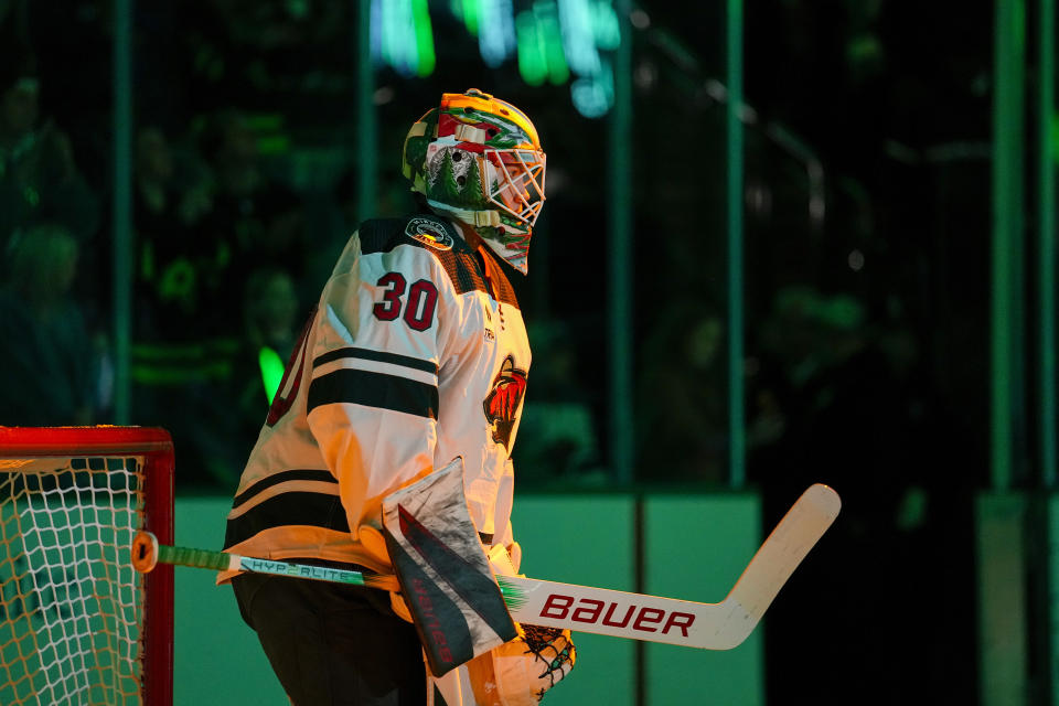 Minnesota Wild goalkeeper Jesper Wallstedt looks on before making his NHL debut prior to an NHL hockey game against the Dallas Stars, Wednesday, Jan. 10, 2024, in Dallas. (AP Photo/Julio Cortez)