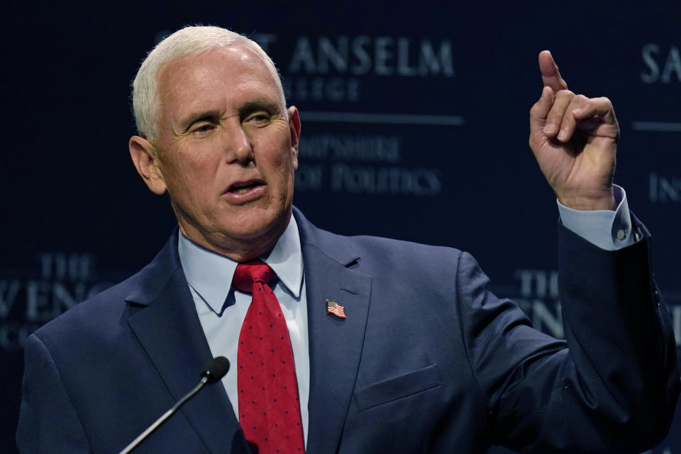 Former Vice President Mike Pence gestures during the "Politics and Eggs" breakfast gathering, Wednesday, Aug. 17, 2022, in Manchester, N.H. (AP Photo/Charles Krupa)