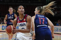 United States' Alyssa Thomas runs around Serbia's Jovana Nogic to score a goal during their quarterfinal game at the women's Basketball World Cup in Sydney, Australia, Thursday, Sept. 29, 2022. (AP Photo/Mark Baker)