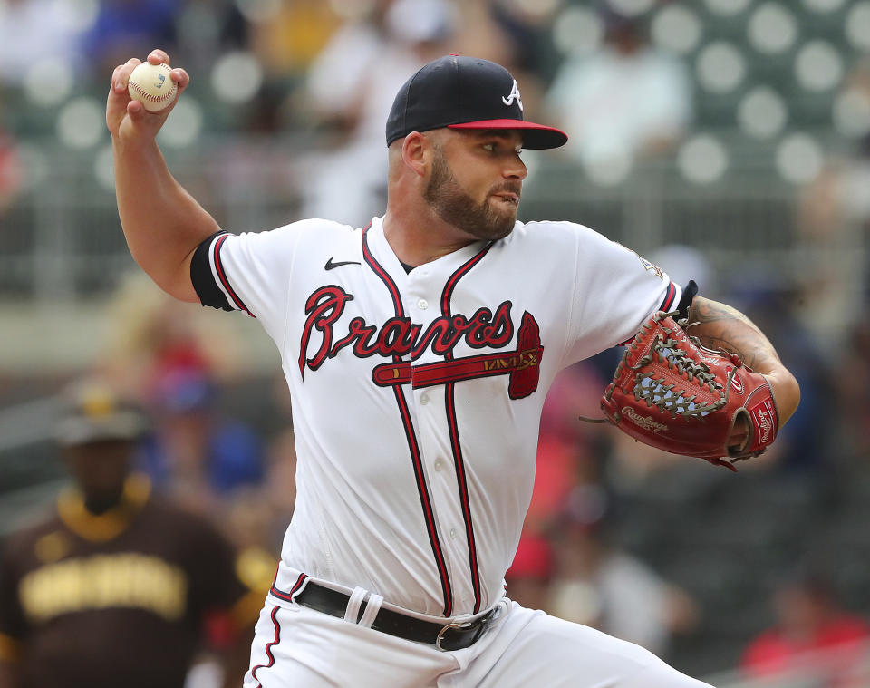 Atlanta Braves starting pitcher Bryse Wilson delivers a pitch against the San Diego Padres during the first inning in the second baseball game of a doubleheader Wednesday, July 21, 2021, in Atlanta. (Curtis Compton/Atlanta Journal-Constitution via AP)