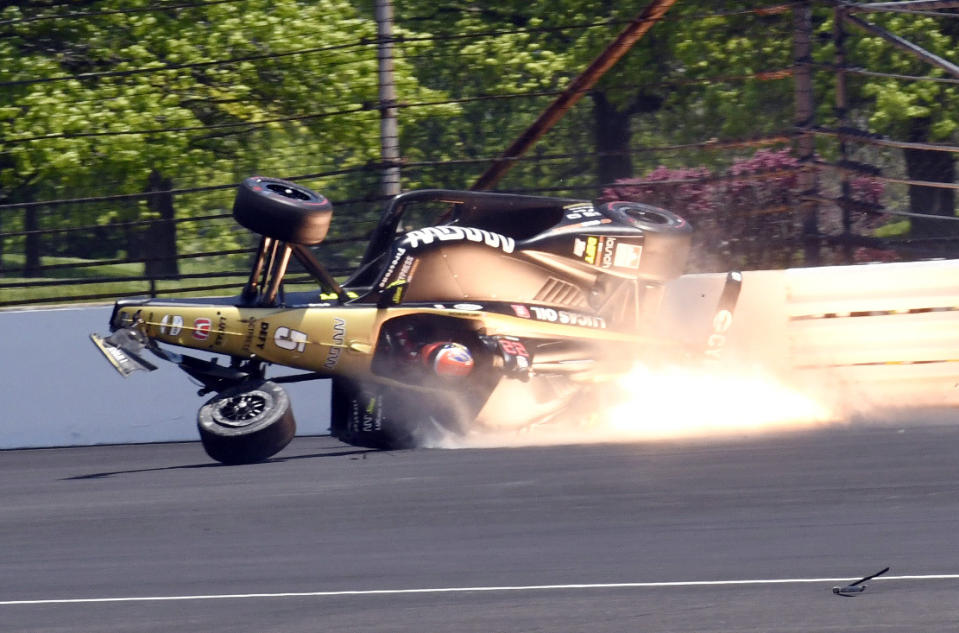 James Hinchcliffe, of Canada, slides into the backstretch after hitting the wall along the second turn during qualifications for the Indianapolis 500 IndyCar auto race at Indianapolis Motor Speedway, Saturday, May 18, 2019, in Indianapolis. (AP Photo/Greg Huey)