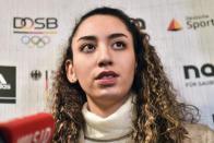 Iranian Taekwondo athlete Kimia Alizadeh speaks to the media at a press conference in Luenen, Germany, Friday, Jan. 24, 2020. Iran's only female Olympic medalist fled from the Islamic Republic and said she wants to compete for Germany. (AP Photo/Martin Meissner)