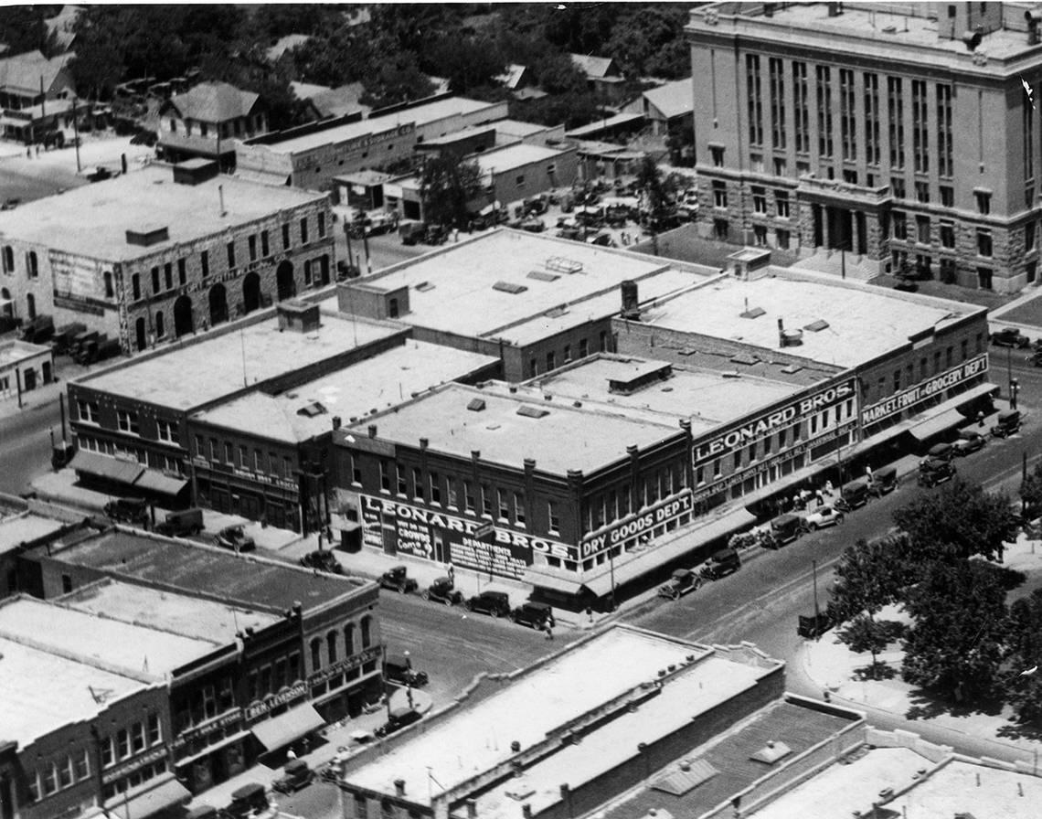 1930: Aerial view of the Leonard Brothers department store. Also seen are the city jail and Fort Worth Welding Co.